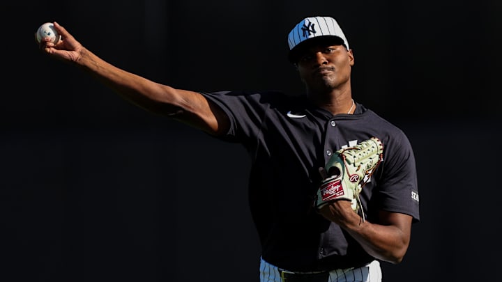 Feb 12, 2025; Tampa, FL, USA; New York Yankees pitcher Yerry de los Santos (73) participates in spring training workouts at George M. Steinbrenner Field.