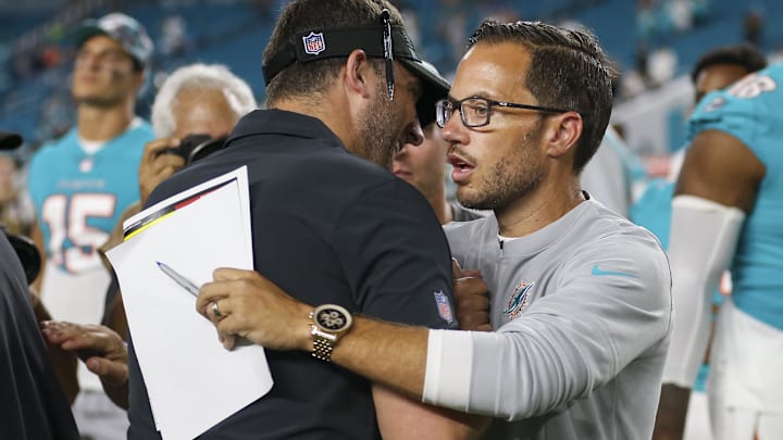 Aug 27, 2022; Miami Gardens, Florida, USA; Former Miami Dolphins head coach Mike McDaniel and Philadelphia Eagles head coach Nick Sirianni talk on the field after the game at Hard Rock Stadium. Aug 27, 2022; Miami Gardens, Florida, USA; Former Miami Dolphins head coach Mike McDaniel and Philadelphia Eagles head coach Nick Sirianni talk on the field after the game at Hard Rock Stadium.