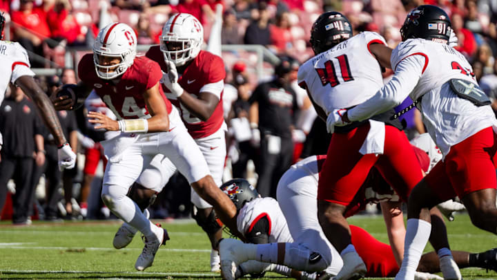 Stanford quarterback Ashton Daniels on the run. Stanford quarterback Ashton Daniels on the run.
