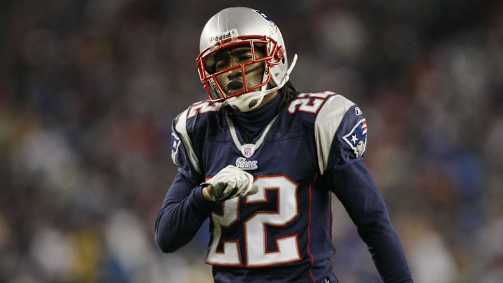 Jan 20, 2007; Foxborough, MA, USA; New England Patriots cornerback Asante Samuel (22) reacts in the second half against the San Diego Chargers during the AFC Championship game at Gillette Stadium.  New England won the game 21-12.  Mandatory Credit: David Butler II-Imagn Images