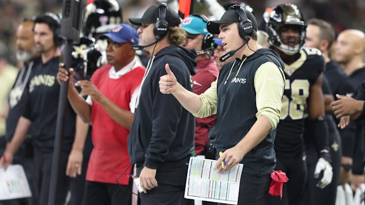 Nov 23, 2025; New Orleans, Louisiana, USA; New Orleans Saints head coach Kellen Moore reacts on the sidelines during the second half against the Atlanta Falcons at Caesars Superdome. Mandatory Credit: Stephen Lew-Imagn Images Nov 23, 2025; New Orleans, Louisiana, USA; New Orleans Saints head coach Kellen Moore reacts on the sidelines during the second half against the Atlanta Falcons at Caesars Superdome. Mandatory Credit: Stephen Lew-Imagn Images