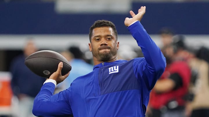 Sep 14, 2025; Arlington, Texas, USA; New York Giants quarterback Russell Wilson (3) warms up before the game against the Dallas Cowboys at AT&T Stadium.