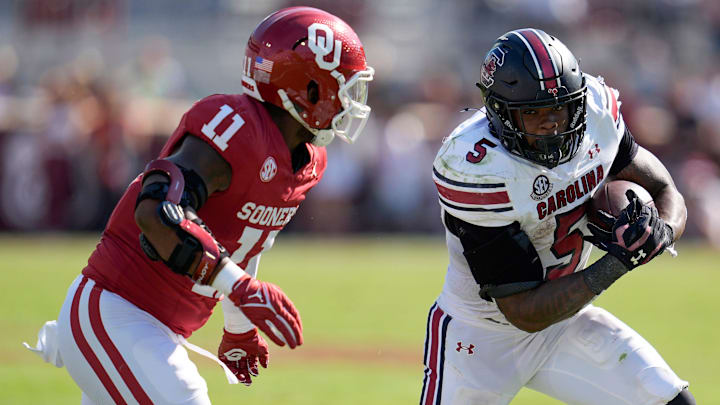 Oklahoma Sooners linebacker Kobie McKinzie (11) chases after South Carolina Gamecocks running back Raheim Sanders (5) during a college football game between the University of Oklahoma Sooners (OU) and the South Carolina Gamecocks at Gaylord Family - Oklahoma Memorial Stadium in Norman, Okla., Saturday, Oct. 19, 2024.