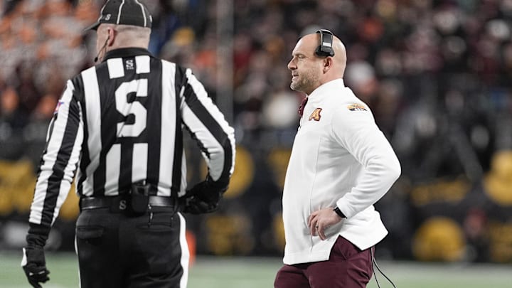 Jan 3, 2025; Charlotte, NC, USA; Minnesota Golden Gophers head coach P.J. Fleck during the first quarter against the Virginia Tech Hokies at the Dukes’ Mayo Bowl at Bank of America Stadium. Mandatory Credit: Jim Dedmon-Imagn Images