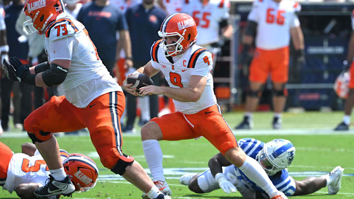 Sep 6, 2025; Durham, North Carolina, USA; Illinois Fighting Illini quarterback Luke Altmyer (9) runs during the first quarter against the Duke Blue Devils at Wallace Wade Stadium. Mandatory Credit: Zachary Taft-Imagn Images Sep 6, 2025; Durham, North Carolina, USA; Illinois Fighting Illini quarterback Luke Altmyer (9) runs during the first quarter against the Duke Blue Devils at Wallace Wade Stadium. Mandatory Credit: Zachary Taft-Imagn Images