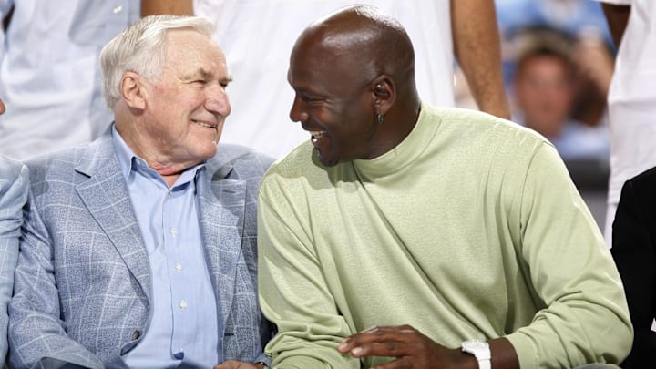 Aug 4, 2009; Chapel Hill, NC, USA; North Carolina Tar Heel former head coach Dean Smith and former player Michael Jordan talk during the Professional Alumni game at the Dean E. Smith Center. Mandatory Credit: Bob Donnan-Imagn Images