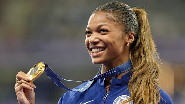 Gabby Thomas celebrates her gold medal in the women’s 200m during the Paris 2024 Olympic Summer Games.