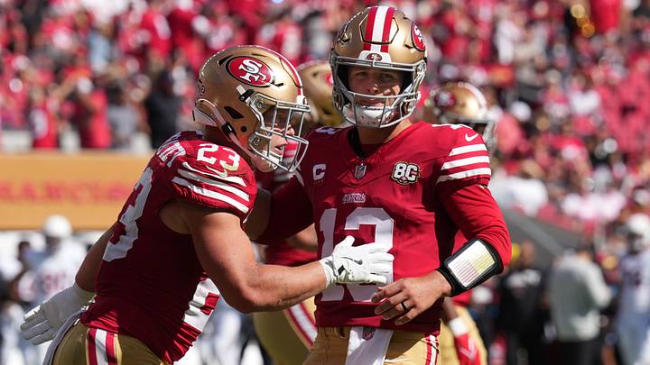 Sep 27, 2026; Santa Clara, California, USA; San Francisco 49ers running back Christian McCaffrey (23) celebrates with quarterback Brock Purdy (right) after scoring a touchdown against the Arizona Cardinals during the third quarter at Levi's Stadium. Sep 27, 2026; Santa Clara, California, USA; San Francisco 49ers running back Christian McCaffrey (23) celebrates with quarterback Brock Purdy (right) after scoring a touchdown against the Arizona Cardinals during the third quarter at Levi's Stadium.