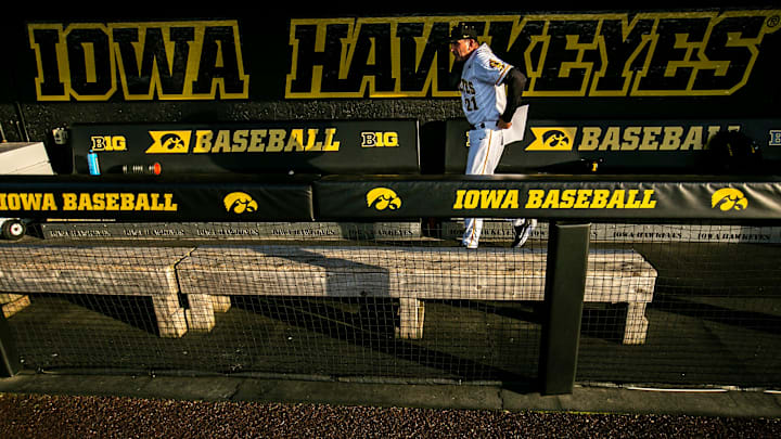 Iowa head coach Rick Heller walks through the dugout before talking with reporters after a NCAA Big Ten Conference baseball game against Northwestern, Monday, April 26, 2021, at Duane Banks Field in Iowa City, Iowa.

210426 Nw Iowa Bsb 044 Jpg