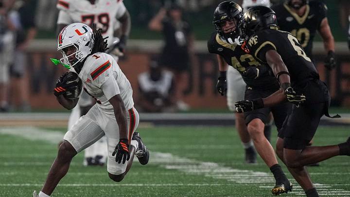 Sep 18, 2026; Winston-Salem, North Carolina, USA;  Miami (FL) Hurricanes wide receiver Malachi Toney (1) runs for yards after the catch against the Wake Forest Demon Deaconsduring the first half at Allegacy Federal Credit Union Stadium.  Mandatory Credit: Jim Dedmon-Imagn Images