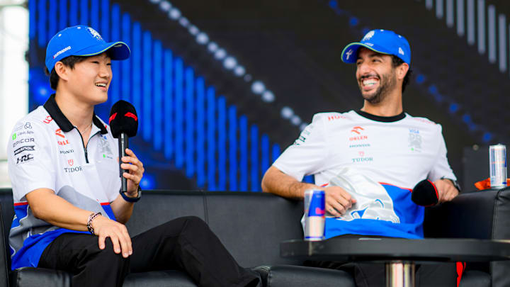 Daniel Ricciardo of Australia and Visa Cash App RB and Yuki Tsunoda of Japan and Visa Cash App RB talk to the crowd on the fan stage prior to practice ahead of the F1 Grand Prix of Azerbaijan at Baku City Circuit on September 13, 2024 in Baku, Azerbaijan. (Photo by Rudy Carezzevoli/Getty Images)