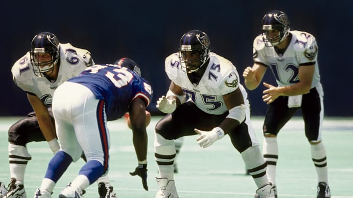 Aug 10, 1996; E. Rutherford, NJ, USA; Baltimore Ravens tackle Jonathan Ogden (75) and center Steve Everitt (61) in action against the New York Giants during a pre-season game at Giants Stadium. FILE PHOTO; Mandatory Credit: Imagn Images