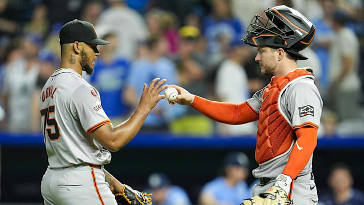 Sep 20, 2024; Kansas City, Missouri, USA; San Francisco Giants relief pitcher Camilo Doval (75) celebrates with catcher Patrick Bailey (14) after defeating the Kansas City Royals at Kauffman Stadium. 