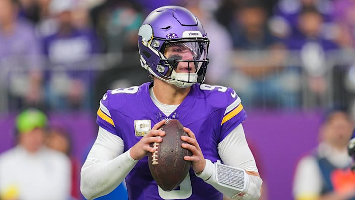 Nov 9, 2025; Minneapolis, Minnesota, USA; Minnesota Vikings quarterback J.J. McCarthy (9) drops back to pass against the Baltimore Ravens in the second quarter at U.S. Bank Stadium.
