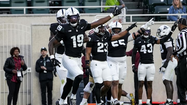 Sep 6, 2025; East Lansing, Michigan, USA; Michigan State defensive back Armorion Smith (19) celebrates a fumble recovery in the first quarter at Spartan Stadium. Mandatory Credit: Brendan Mullin-Imagn Images