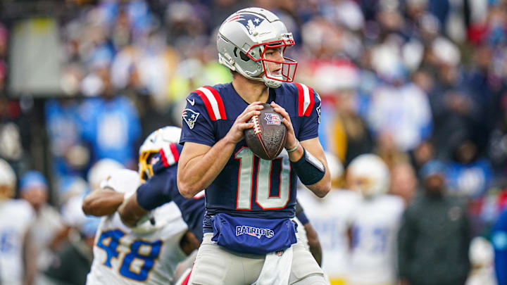 Dec 28, 2024; Foxborough, Massachusetts, USA; New England Patriots quarterback Drake Maye (10) looks to pass the ball against the Los Angeles Chargers in the first half at Gillette Stadium. Mandatory Credit: David Butler II-Imagn Images