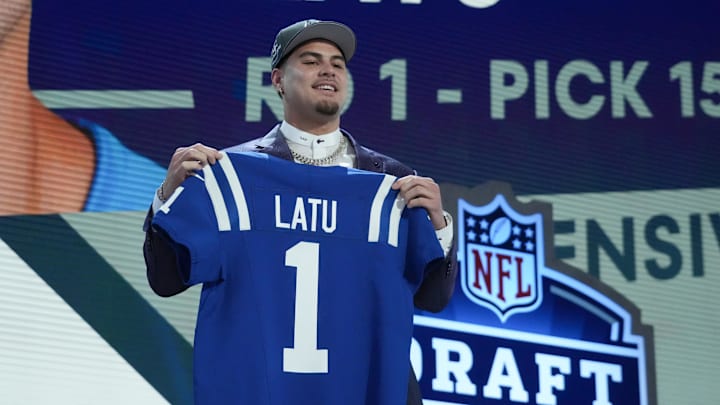 Apr 25, 2024; Detroit, MI, USA; UCLA Bruins defensive lineman Laiatu Latu poses after being selected by the Indianapolis Colts as the No. 15 pick in the first round of the 2024 NFL Draft at Campus Martius Park and Hart Plaza. Mandatory Credit: Kirby Lee-Imagn Images