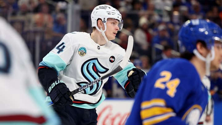 Jan 11, 2025; Buffalo, New York, USA;  Seattle Kraken right wing Kaapo Kakko (84) reacts after scoring a goal during the third period against the Buffalo Sabres at KeyBank Center. Mandatory Credit: Timothy T. Ludwig-Imagn Images