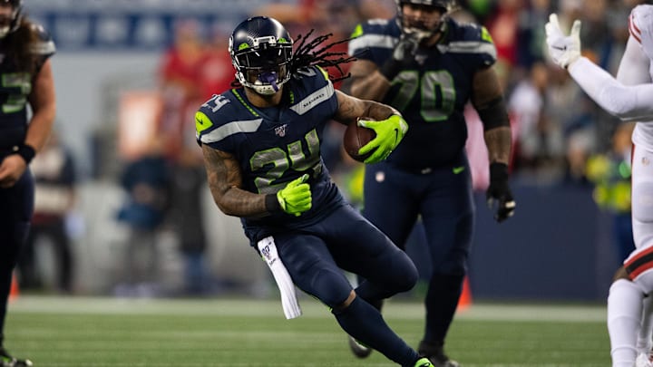 Dec 29, 2019; Seattle, Washington, USA; Seattle Seahawks running back Marshawn Lynch (24) carries the ball against the San Francisco 49ers during the second half at CenturyLink Field. San Francisco defeated Seattle 26-21. Mandatory Credit: Steven Bisig-Imagn Images Dec 29, 2019; Seattle, Washington, USA; Seattle Seahawks running back Marshawn Lynch (24) carries the ball against the San Francisco 49ers during the second half at CenturyLink Field. San Francisco defeated Seattle 26-21. Mandatory Credit: Steven Bisig-Imagn Images