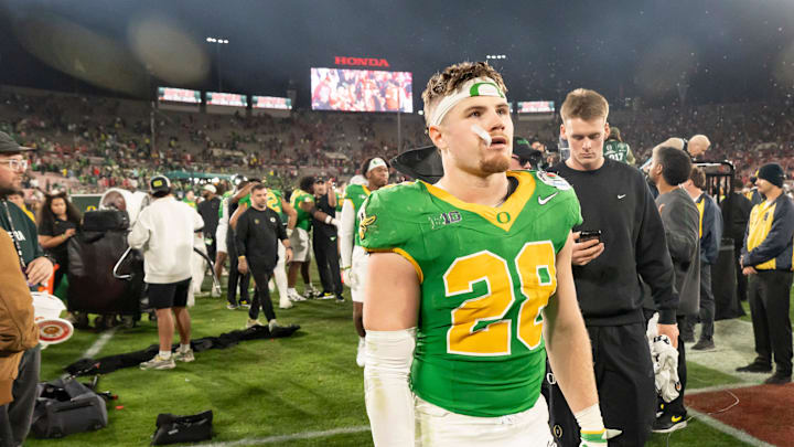 Oregon inside linebacker Bryce Boettcher walks off the field as the Oregon Ducks face the Ohio State Buckeyes Wednesday, Jan. 1, 2025, in the quarterfinal of the College Football Playoff at the Rose Bowl in Pasadena, Calif.