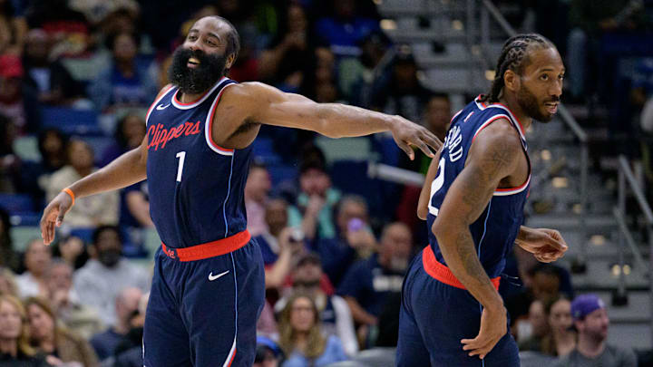Mar 11, 2025; New Orleans, Louisiana, USA; Los Angeles Clippers forward Kawhi Leonard (2) and Los Angeles Clippers guard James Harden (1) react during the second half against the New Orleans Pelicans at Smoothie King Center. Mandatory Credit: Matthew Hinton-Imagn Images
