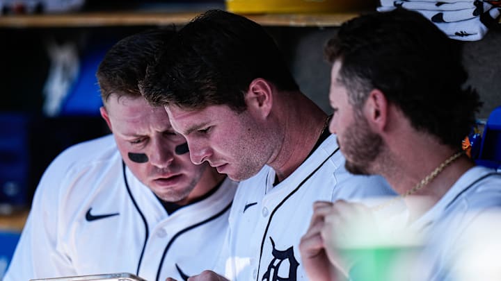 From left, Detroit Tigers first base Spencer Torkelson (20), third base Colt Keith (33) and shortstop Zach McKinstry (39) watch on an iPad in the dugout during the first inning against Cleveland Guardians at Comerica Park in Detroit on Thursday, Sept. 18, 2025. From left, Detroit Tigers first base Spencer Torkelson (20), third base Colt Keith (33) and shortstop Zach McKinstry (39) watch on an iPad in the dugout during the first inning against Cleveland Guardians at Comerica Park in Detroit on Thursday, Sept. 18, 2025.