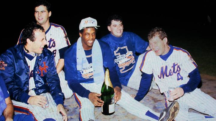 Mets Rick Aguilera, Lenny Dykstra, Bobby Ojeda, and Dwight Gooden celebrate on the field after defeating the Red Sox in Game 7 to win the World Series at Shea Stadium Oct. 27, 1986.

Mets Vs Red Sox 1986 World Series