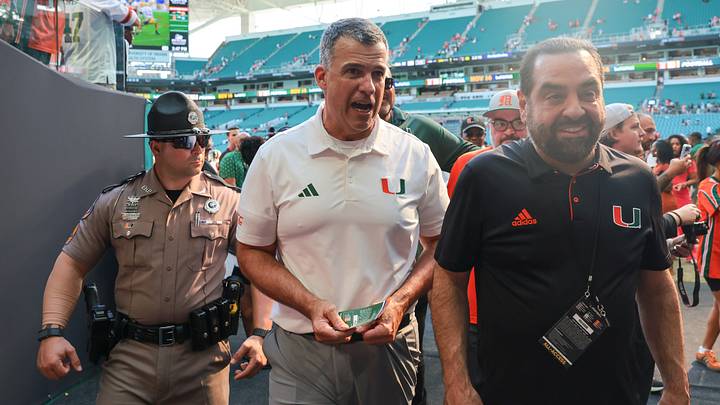 Oct 24, 2026; Miami Gardens, Florida, USA; Miami Hurricanes head coach Mario Cristobal exits the field after the game against the Pittsburgh Panthers at Hard Rock Stadium. Mandatory Credit: Sam Navarro-Imagn Images Oct 24, 2026; Miami Gardens, Florida, USA; Miami Hurricanes head coach Mario Cristobal exits the field after the game against the Pittsburgh Panthers at Hard Rock Stadium. Mandatory Credit: Sam Navarro-Imagn Images