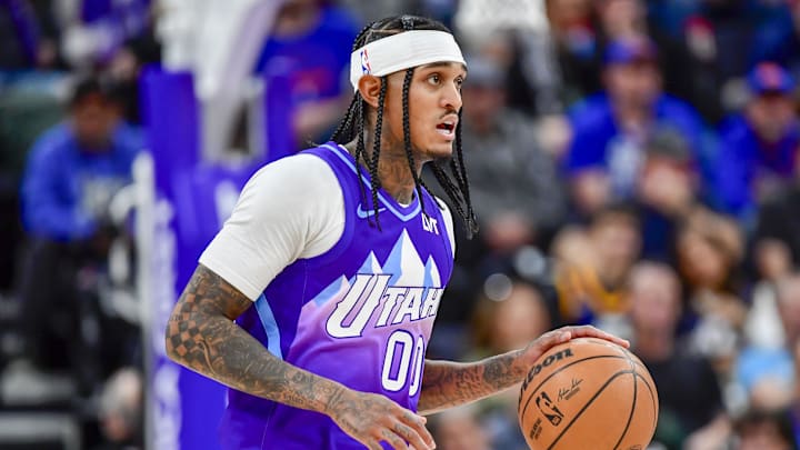 Nov 23, 2024; Salt Lake City, Utah, USA; Utah Jazz guard Jordan Clarkson (00) dribbles the ball downcourt against the New York Knicks during the second half at the Delta Center. Mandatory Credit: Christopher Creveling-Imagn Images