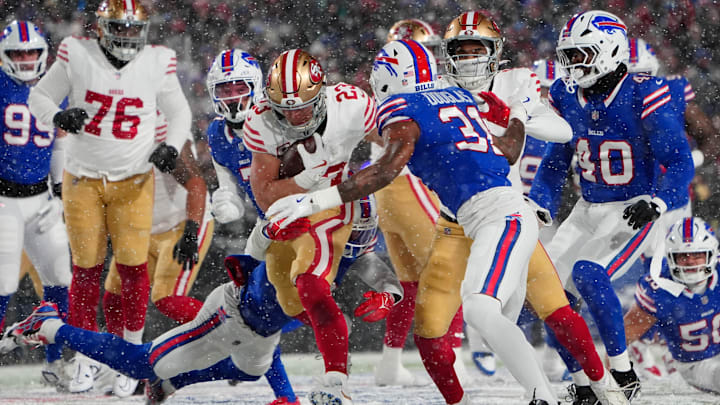 Dec 1, 2024; Orchard Park, New York, USA; Buffalo Bills cornerback Rasul Douglas (31) tackles San Francisco 49ers running back Christian McCaffrey (23) during the first half at Highmark Stadium.