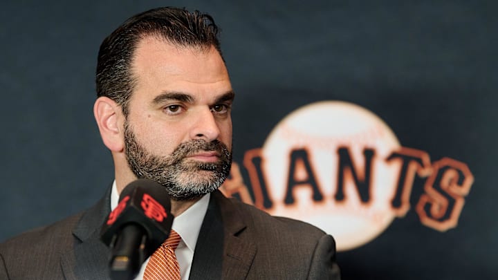 Dec 12, 2024; San Francisco, CA, USA; San Francisco Giants general manager Zack Minasian listens during the introductory press conference for shortstop Willy Adames (not pictured) at Oracle Park.  Mandatory Credit: Robert Edwards-Imagn Images