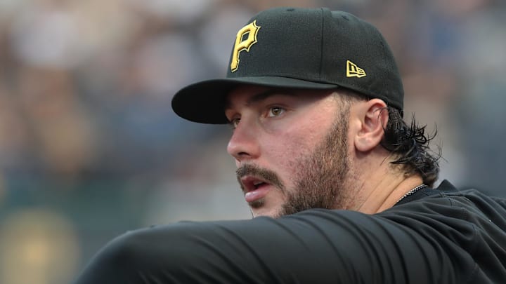Sep 2, 2025; Pittsburgh, Pennsylvania, USA;  Pittsburgh Pirates  pitcher Paul Skenes (30) looks from the dugout against the Los Angeles Dodgers during the third inning at PNC Park. Mandatory Credit: Charles LeClaire-Imagn Images