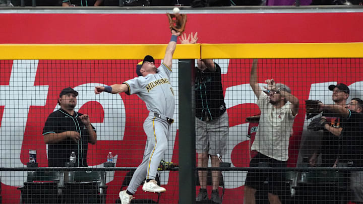Sep 14, 2024; Phoenix, Arizona, USA; Milwaukee Brewers outfielder Sal Frelick (10) makes a catch for an out against the Arizona Diamondbacks in the first inning at Chase Field. Mandatory Credit: Rick Scuteri-Imagn Images