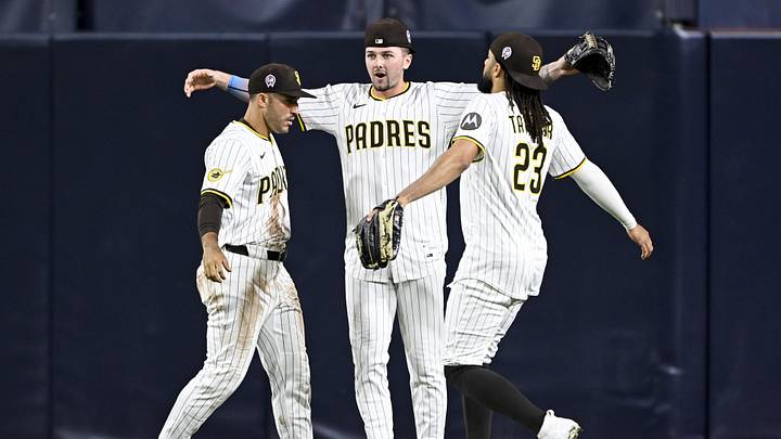 Sep 11, 2025; San Diego, California, USA; San Diego Padres right fielder Ramon Laureano (5), left, Jackson Merrill (3), center, and Fernando Tatis Jr. (23) celebrate after the Padres defeated the Colorado Rockies at Petco Park. Mandatory Credit: Denis Poroy-Imagn Images Sep 11, 2025; San Diego, California, USA; San Diego Padres right fielder Ramon Laureano (5), left, Jackson Merrill (3), center, and Fernando Tatis Jr. (23) celebrate after the Padres defeated the Colorado Rockies at Petco Park. Mandatory Credit: Denis Poroy-Imagn Images