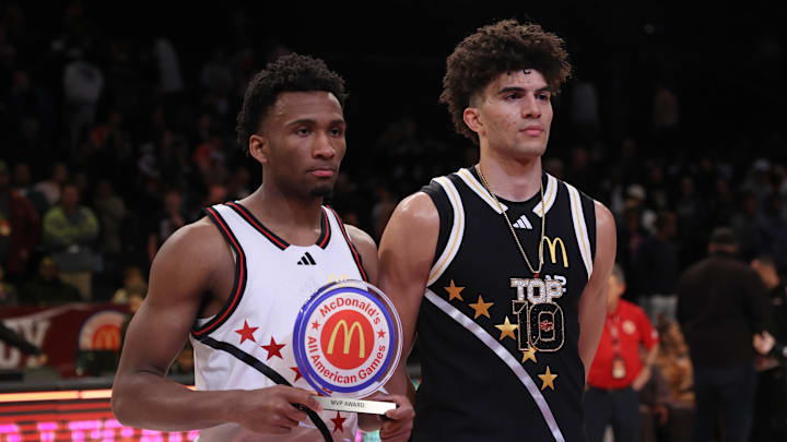 Apr 1, 2025; Brooklyn, NY, USA; McDonald's All American West guard Darryn Peterson (22) and McDonald's All American East forward Cameron Boozer (12) pose for photos after the game at Barclays Center. Mandatory Credit: Pamela Smith-Imagn Images