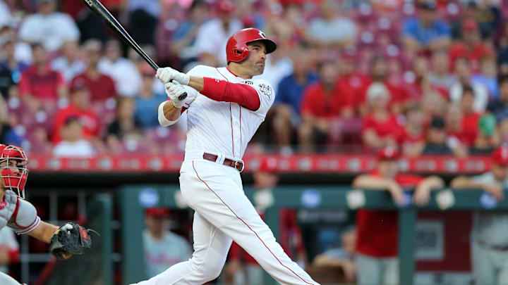 Cincinnati Reds first baseman Joey Votto (19) hits a double in the second inning of an MLB baseball game against the Philadelphia Phillies, Wednesday, Sept. 4, 2019, at Great American Ball Park in Cincinnati.