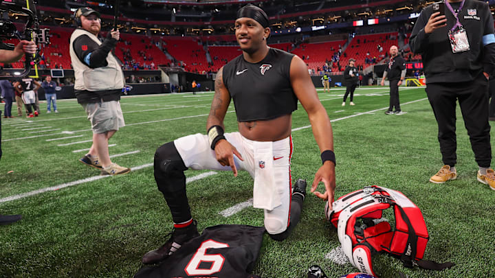 Atlanta Falcons quarterback Michael Penix Jr. signs his jersey after a victory over the New York Giants. Atlanta Falcons quarterback Michael Penix Jr. signs his jersey after a victory over the New York Giants.