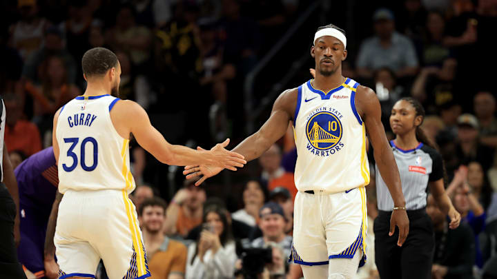Apr 8, 2025; Phoenix, Arizona, USA; Golden State Warriors forward Jimmy Butler III (10) with guard Stephen Curry (30) against the Phoenix Suns at Footprint Center. Mandatory Credit: Mark J. Rebilas-Imagn Images
