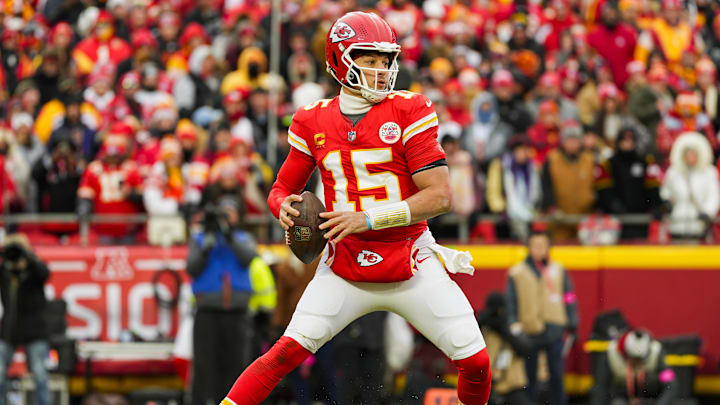 Jan 18, 2025; Kansas City, Missouri, USA; Kansas City Chiefs quarterback Patrick Mahomes (15) drops back to pass during the first half against Houston Texans in a 2025 AFC divisional round game at GEHA Field at Arrowhead Stadium. Mandatory Credit: Jay Biggerstaff-Imagn Images