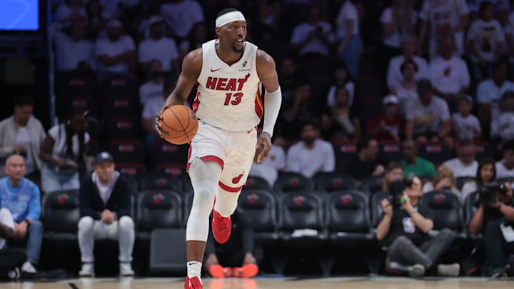 Apr 26, 2025; Miami, Florida, USA; Miami Heat center Bam Adebayo (13) dribbles the basketball against the Cleveland Cavaliers in the third quarter during game three for the first round of the 2025 NBA Playoffs at Kaseya Center. Mandatory Credit: Sam Navarro-Imagn Images