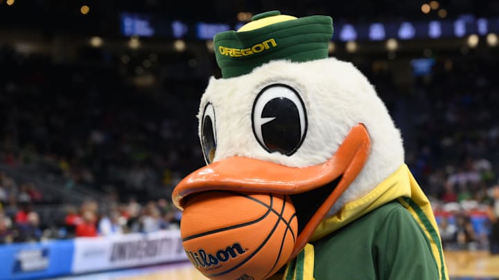 Mar 21, 2025; Seattle, WA, USA; The Oregon Ducks mascot performs during the second half in the first round of the NCAA Tournament at Climate Pledge Arena. Mandatory Credit: Steven Bisig-Imagn Images