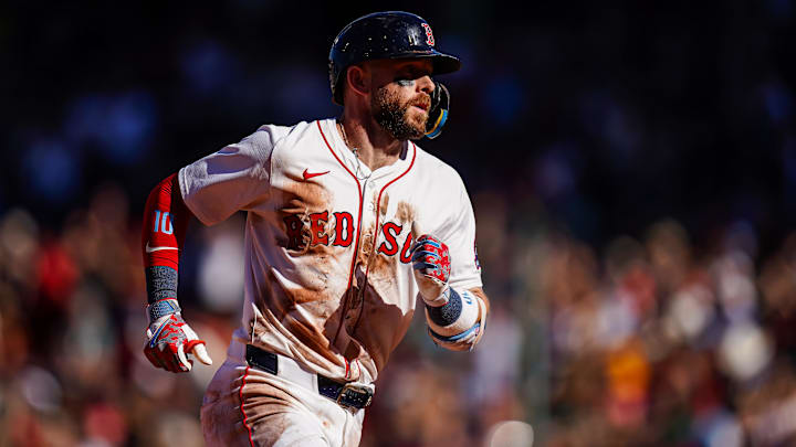Boston Red Sox shortstop Trevor Story (10) hits a home run against the Athletics in the eighth inning at Fenway Park. Mandatory Credit: David Butler II-Imagn Images