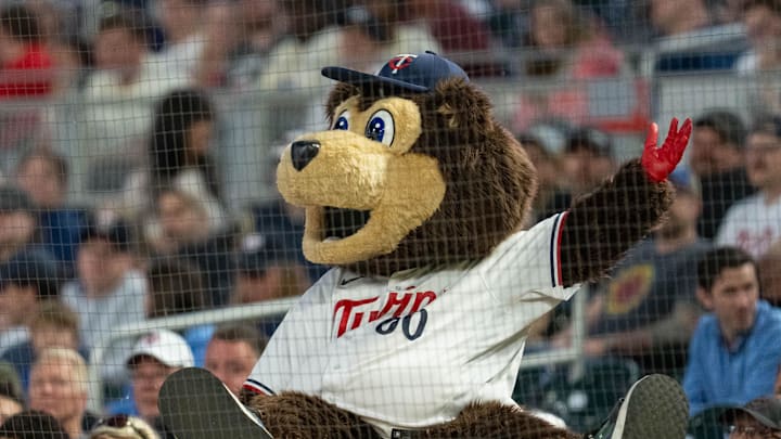 May 15, 2024; Minneapolis, Minnesota, USA; Minnesota Twins mascot T.C. Bear engages with fans in the game against the New York Yankees at Target Field. Mandatory Credit: Matt Blewett-Imagn Images