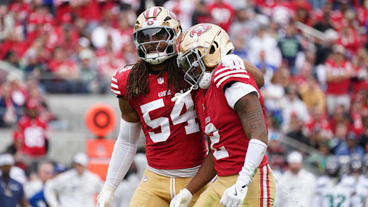 Nov 17, 2024; Santa Clara, California, USA; San Francisco 49ers linebacker Fred Warner (54) calms down San Francisco 49ers cornerback Deommodore Lenoir (2) after offsetting penalties against the Seattle Seahawks in the second quarter at Levi's Stadium. Mandatory Credit: David Gonzales-Imagn Images