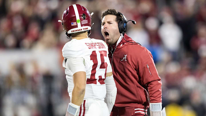 Dec 19, 2025; Norman, OK, USA; Alabama Crimson Tide quarterbacks coach Nick Sheridan with quarterback Ty Simpson (15) against the Oklahoma Sooners during the CFP National Playoff First Round at Gaylord Family Oklahoma Memorial Stadium. Mandatory Credit: Mark J. Rebilas-Imagn Images