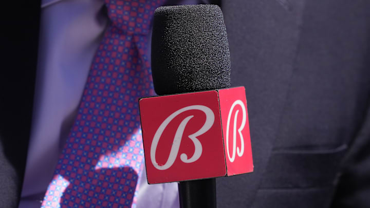 Sep 1, 2024; San Francisco, California, USA; Miami Marlins in-game reporter Craig Minervini holds a microphone with a Bally sports mic flag before the game against the San Francisco Giants at Oracle Park. Sep 1, 2024; San Francisco, California, USA; Miami Marlins in-game reporter Craig Minervini holds a microphone with a Bally sports mic flag before the game against the San Francisco Giants at Oracle Park.