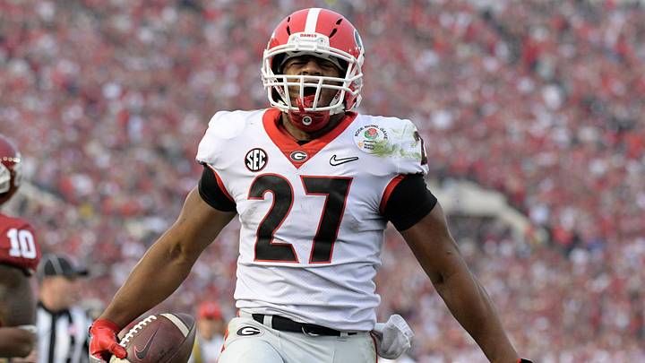 Jan 1, 2018; Pasadena, CA, USA; Georgia Bulldogs running back Nick Chubb (27) celebrates after scoring on a 50-yard touchdown run in the third quarter against the Oklahoma Sooners in the 2018 Rose Bowl college football playoff semifinal game at Rose Bowl Stadium. Georgia defeated Oklahoma 54-48 in two overtimes. Mandatory Credit: Kirby Lee-USA TODAY Sports