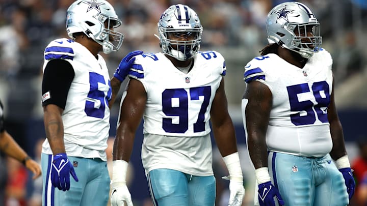 Cowboys DTs Osa Odighizuwa and Mazi Smith on the field in the game against the Jacksonville Jaguars.