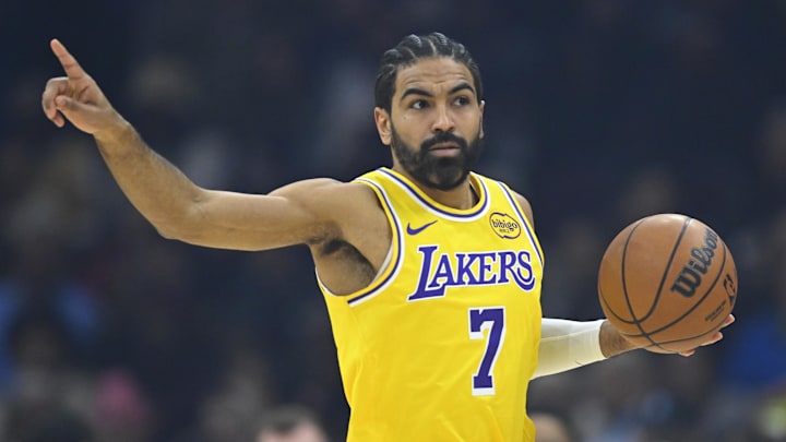 Jan 28, 2026; Cleveland, Ohio, USA; Los Angeles Lakers guard Gabe Vincent (7) brings the ball up court in the first quarter against the Cleveland Cavaliers at Rocket Arena. Mandatory Credit: David Richard-Imagn Images