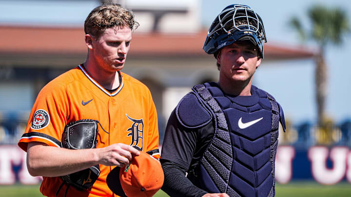 Detroit Tigers pitcher Troy Melton, left, talks to catcher Dillon Dingler after live batting practice. Detroit Tigers pitcher Troy Melton, left, talks to catcher Dillon Dingler after live batting practice.